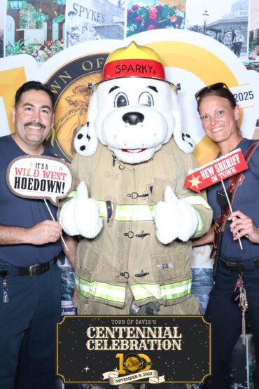 Firefighters taking photo at photo booth