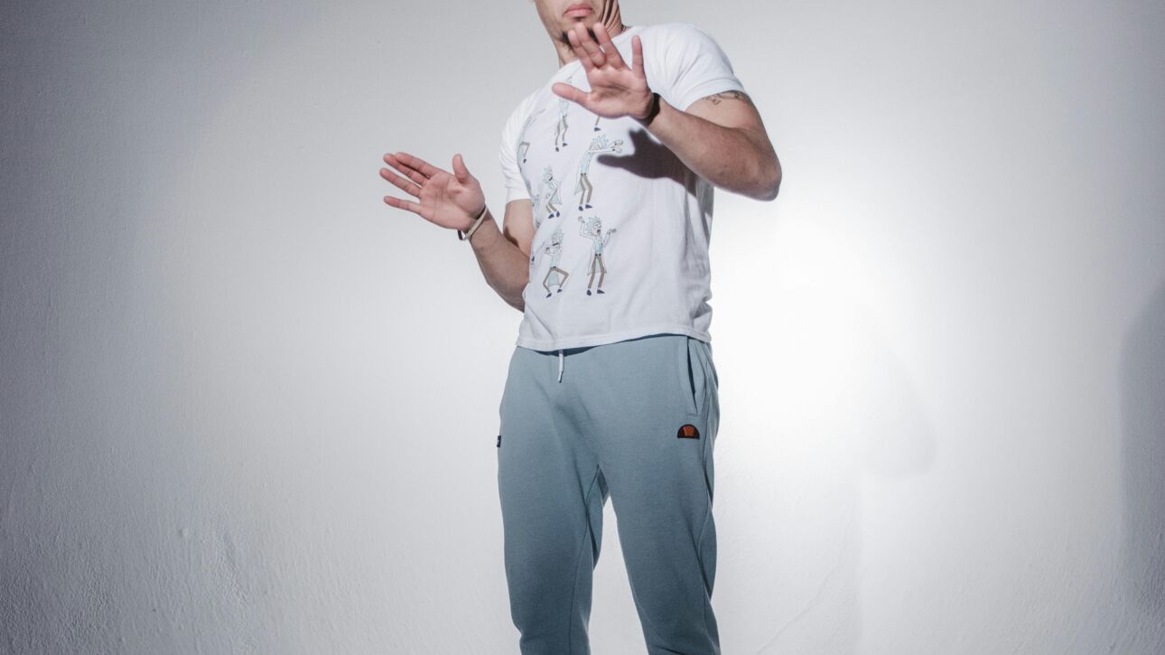 Picture of guy posing for a photo booth backdrop