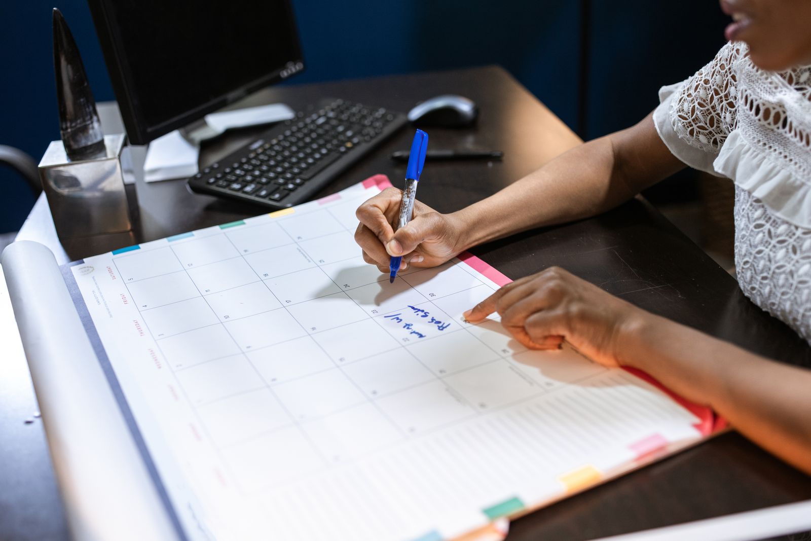 Planner and calendar used to lock in event dates and vendor bookings