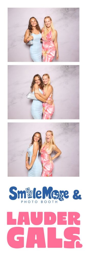 Branded 2x6 photo strip with two guests posing in formal dresses